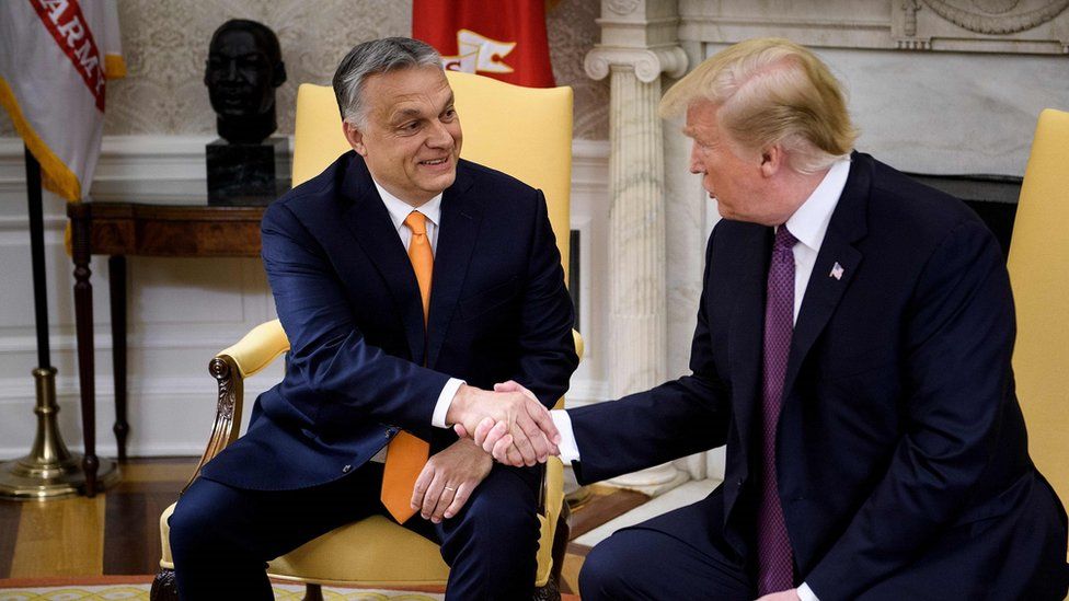 US President Donald Trump shakes hands with Hungarian Prime Minister Viktor Orban during a meeting in the White House