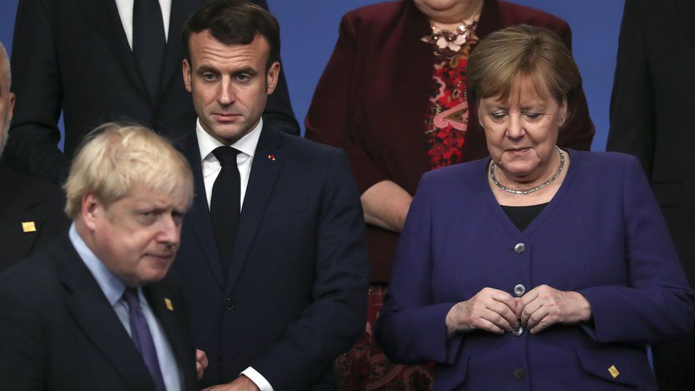 Prime Minister Boris Johnson (left) pictured with French president Emmanuel Macron and German Chancellor Angela Merkel in 2019