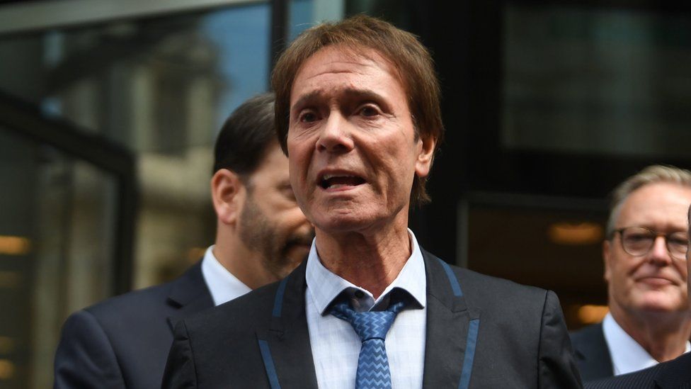 Sir Cliff outside court