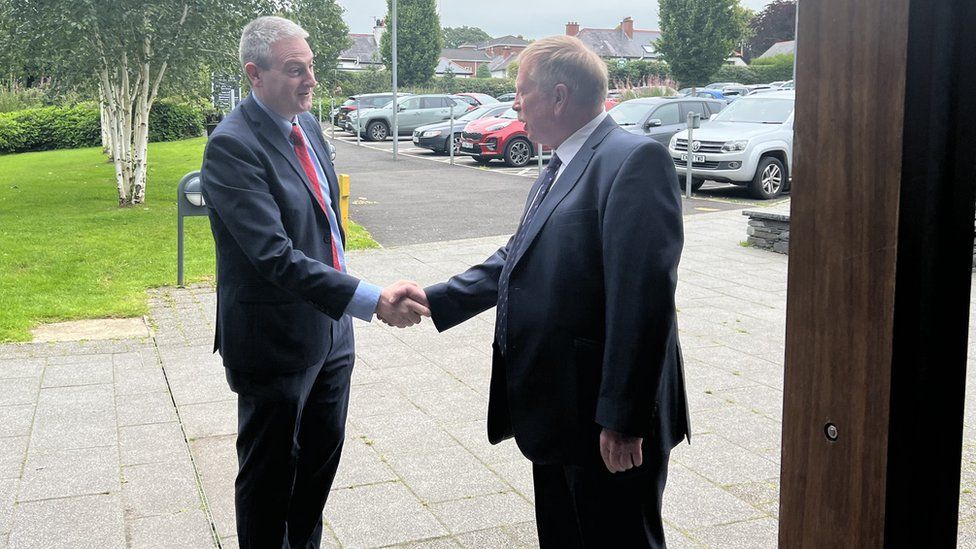 Martin Reilly and Philip McKinney shake hands at Foyle arena