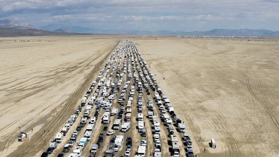 Vehicles leave the Burning Man Festival in Black Rock City, Nevada, USA on September 4, 2023.