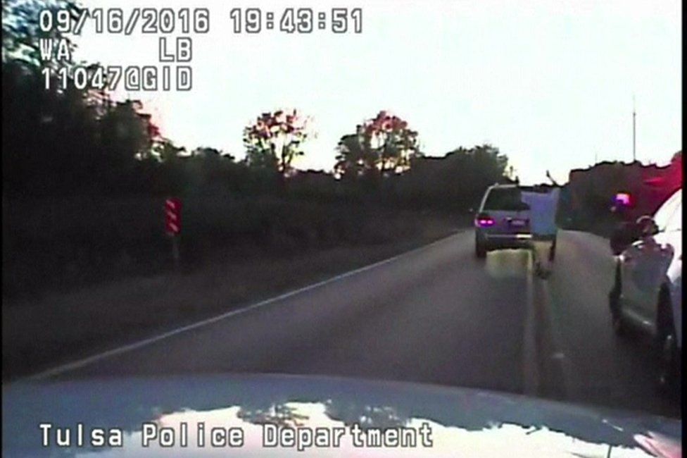 Screengrab of video from the Tulsa Police Department shows Terence Crutcher with his hands up