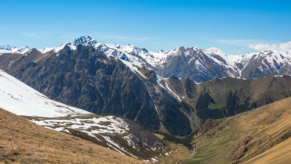 Snow-capped peaks of the Caucasus mountains from the Muhu pass, Karachay-Cherkessia