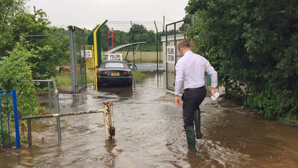A flooding near to a polling station in Surrey