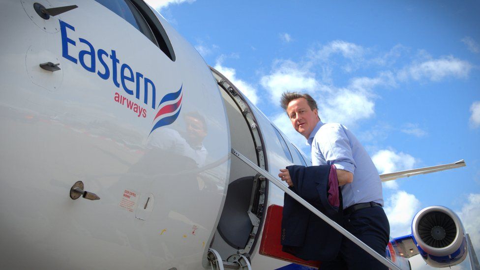 David Cameron boards an Eastern Airways plane