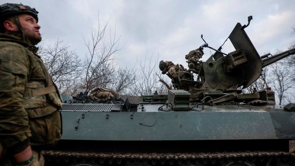 Ukrainian servicemen from air defence unit of the 93rd Mechanized Brigade monitor a sky at a frontline, amid Russia's attack on Ukraine, near the town of Bakhmu