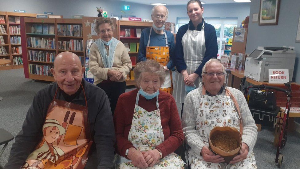 A dementia support group after baking a cake