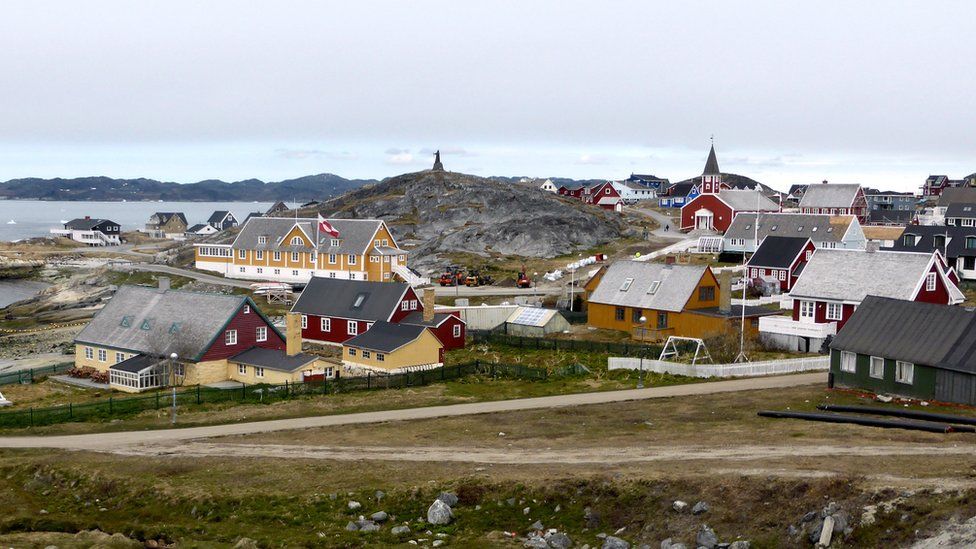 Houses and a church by the sea in Nuuk