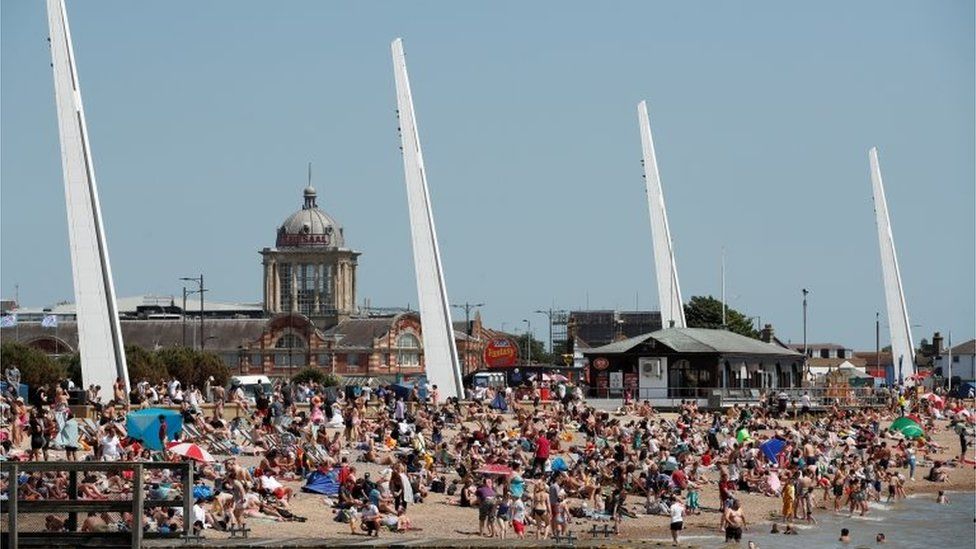 People are seen on the beach in Southend following the outbreak of the coronavirus disease (COVID-19), Southend, Britain, May 25, 2020