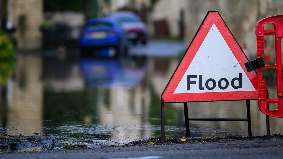 Flood sign near overflows caused the River Cherwell