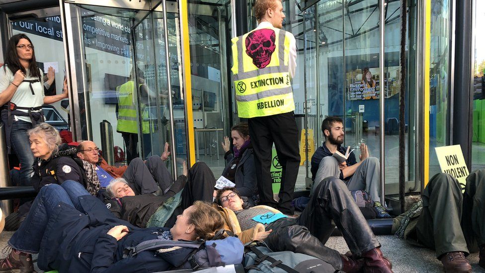 Protesters blockading the offices of the UK's energy department