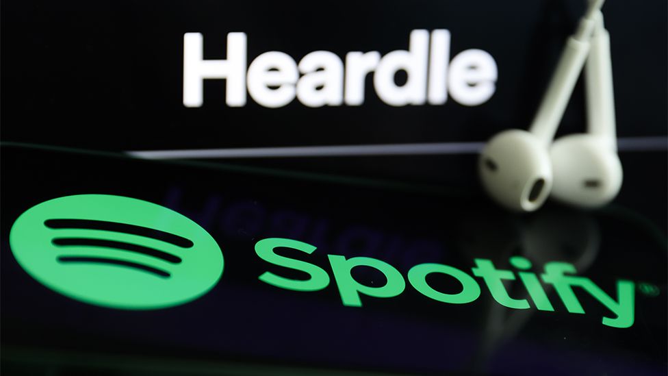 Spotify and Heardle logos