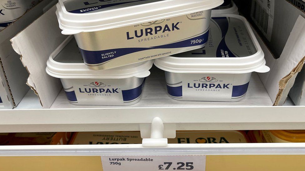 Lurpak butter is displayed on a shelf in a Sainsbury's supermarket on 6 July 2022 in Northwich