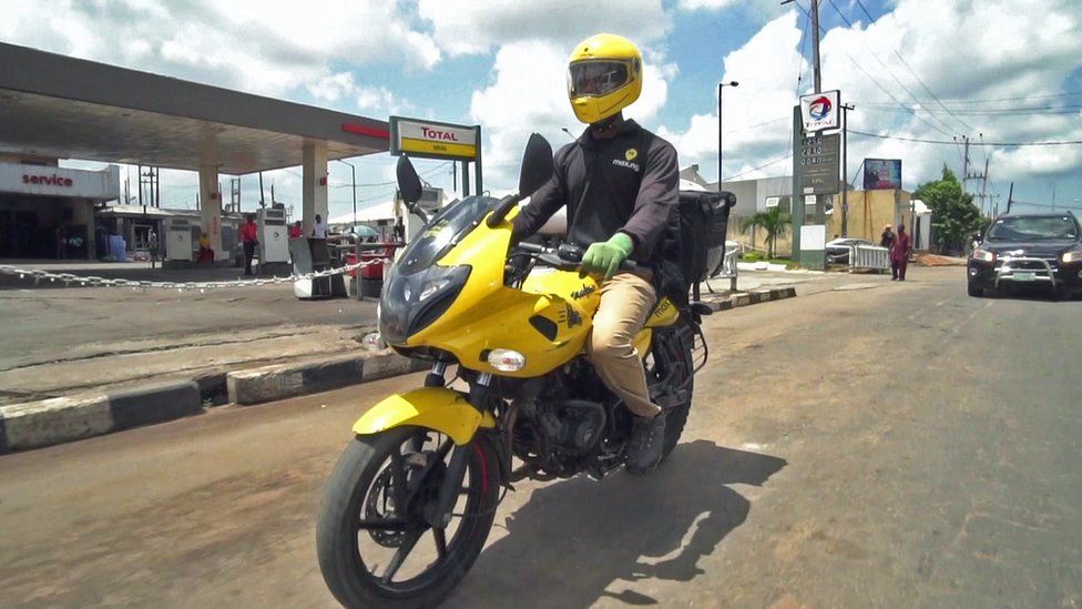 A driver for Nigerian motorcycle transit app startup Max