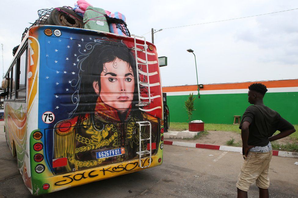 A picture of late US musician Michael Jackson is painted on the back of a bus in Yopougon, a district of Abidjan.