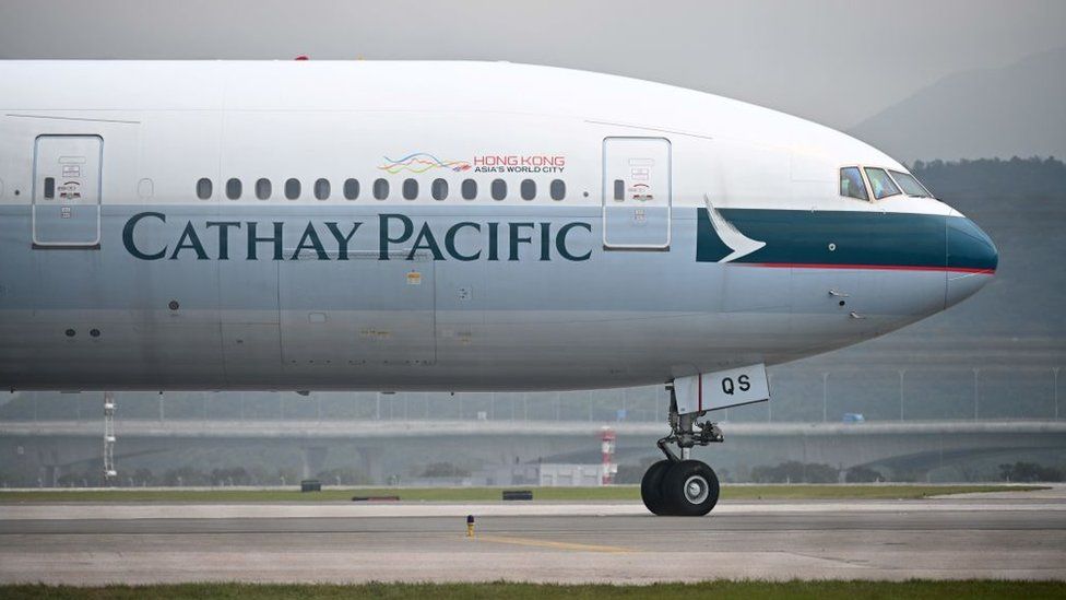 A Cathay Pacific passenger plane prepares to take off from Hong Kong's international airport on March 13, 2019