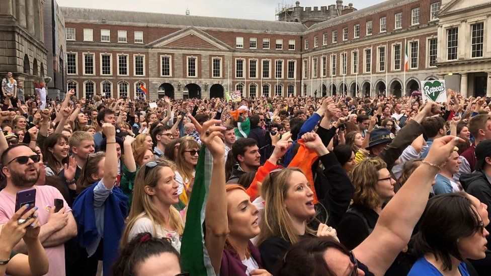 crowds celebrate outside Dublin Castle