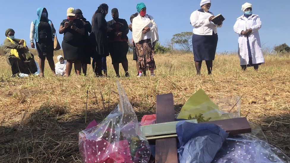 Women holding prayers at the areas where the bodies have been dumped near Mthwalume in South Africa