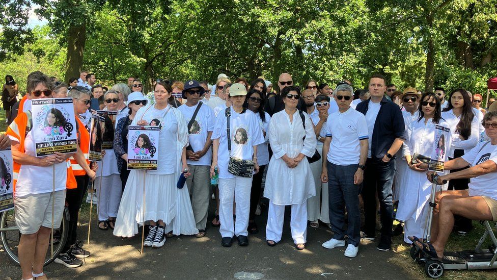 Zara Aleena's family alongside Sadiq Khan and Wes Streeting and other people at the vigil, all dressed in white