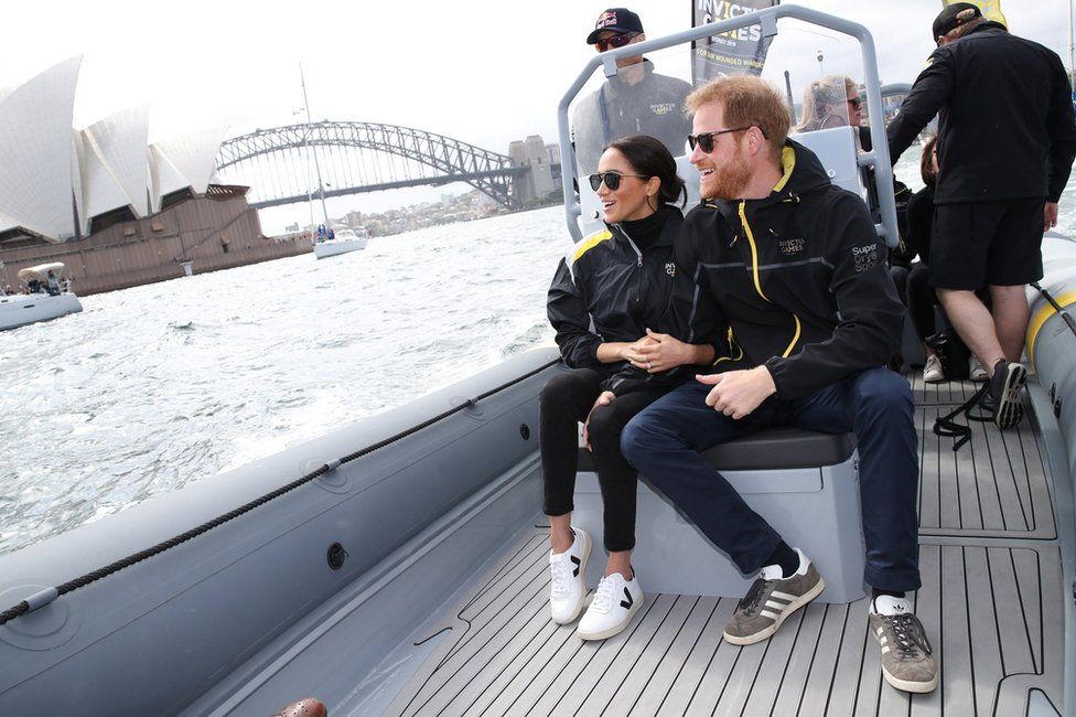 Prince Harry, Duke of Sussex and Meghan, Duchess of Sussex look out at Sydney Opera House and Sydney Harbour Bridge during day two of the Invictus Games Sydney 2018 at Sydney Olympic Park in Sydney, Australia, October 21, 2018