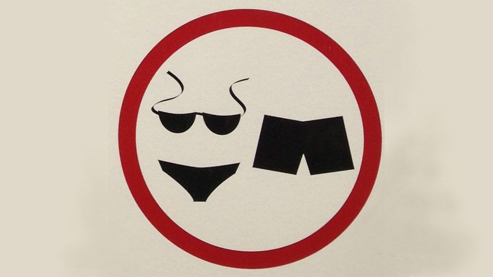 Sign indicating that clothes are not allowed