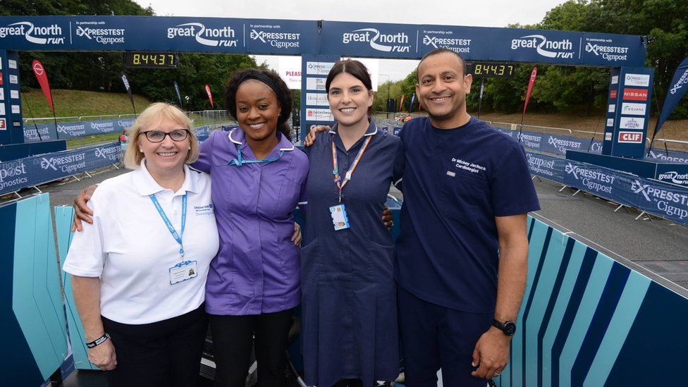 The four NHS workers who were invited to get the event under way