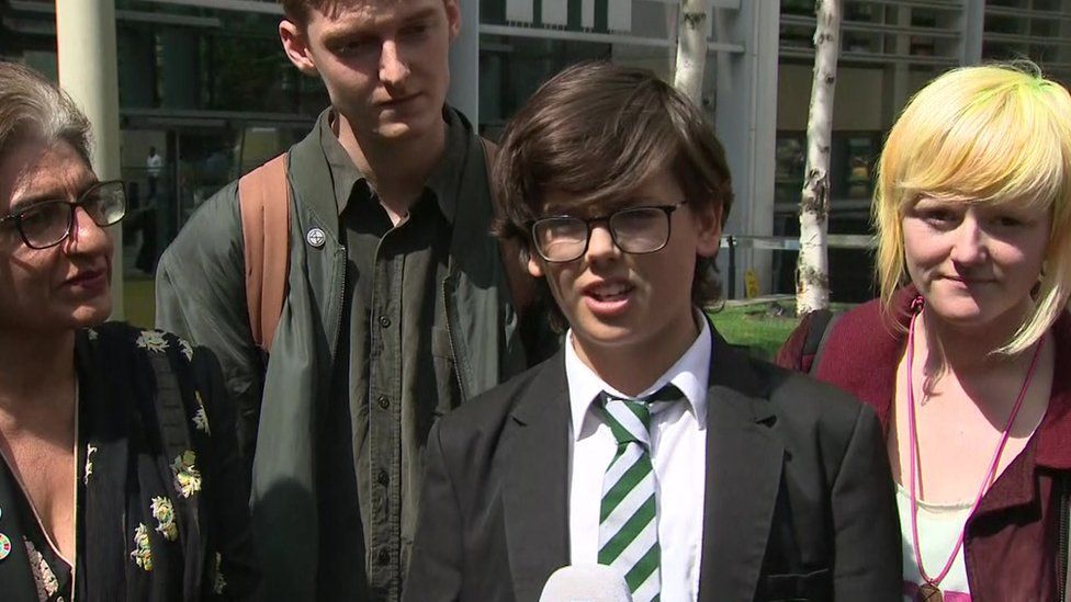 Extinction Rebellion members speak after the meeting with Michael Gove