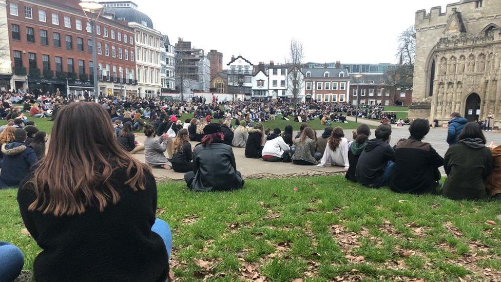 Hundreds sat down in front of Exeter Cathedral