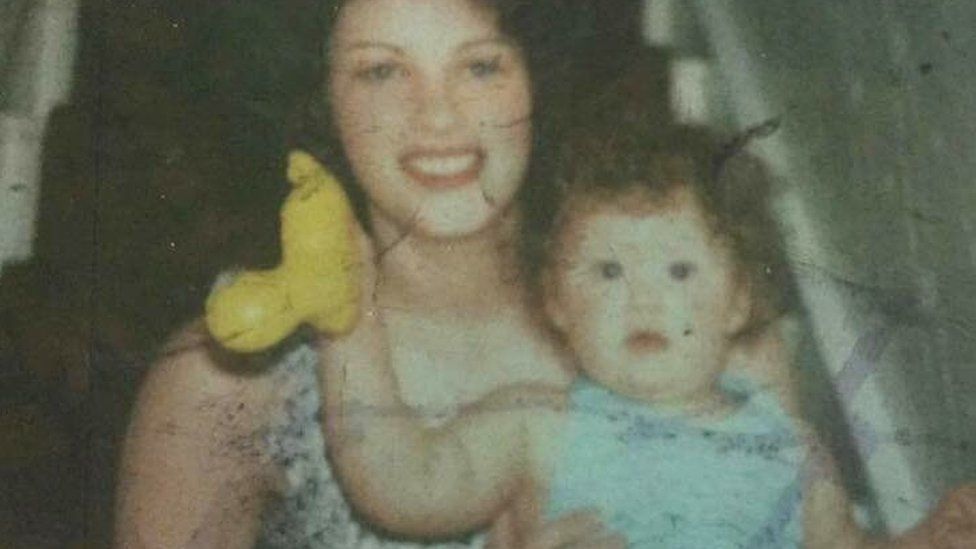 Laura as a baby with her mum