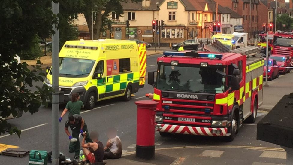 Emergency services including several fire engines and an ambulance at the scene where two of the boys were pulled free from the sewage system