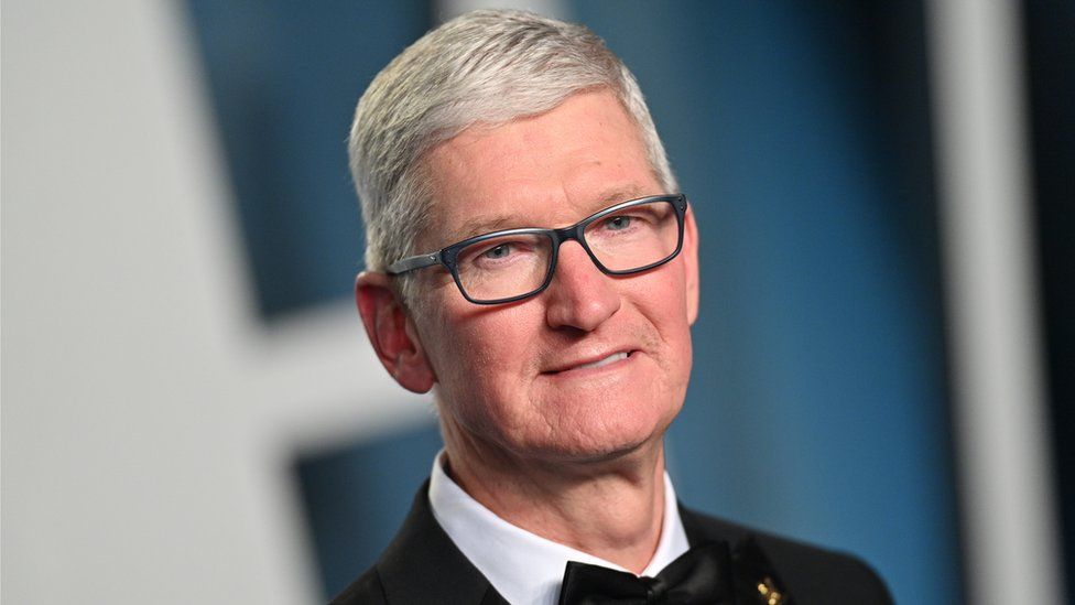 Apple's board cuts chief executive Tim Cook's salary by 40%.
