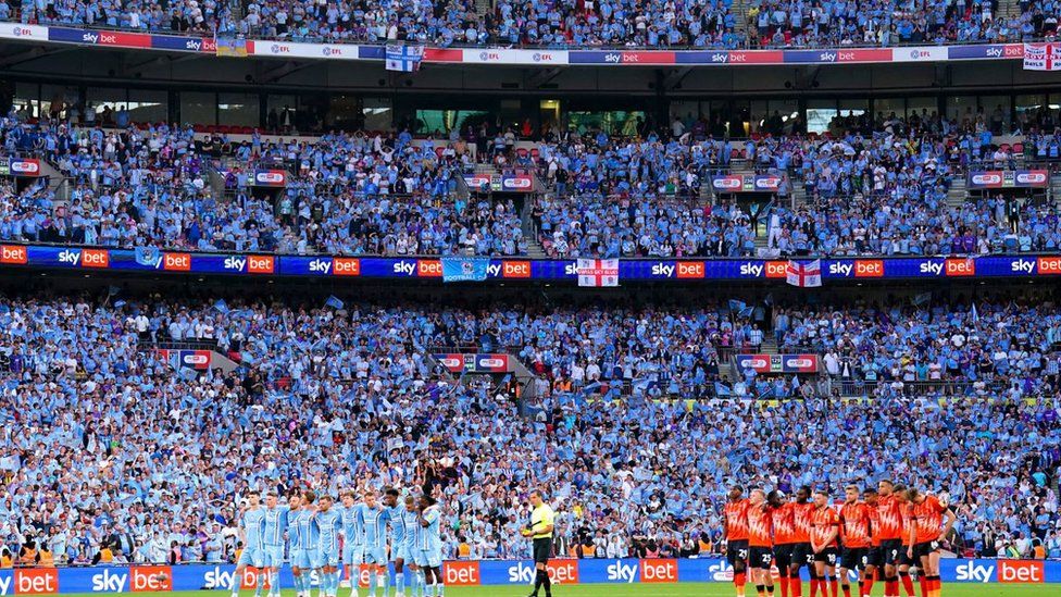 Sky Blues and Luton Town players on the pitch at Wembley