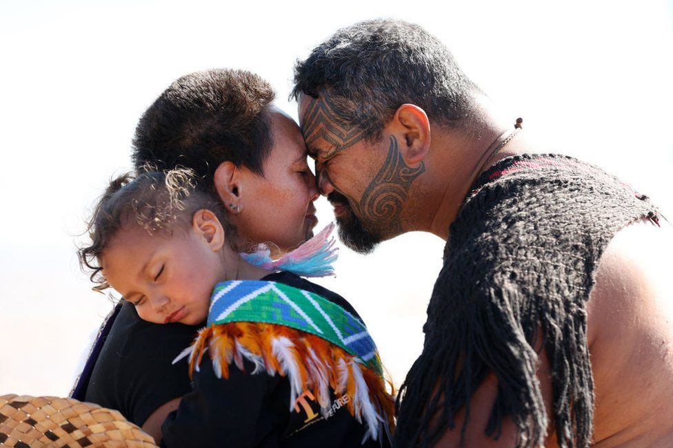 A hongi or greeting as waka arrive on the beach to commemorate Waitangi Day on February 06, 2024 in Waitangi, New Zealand.