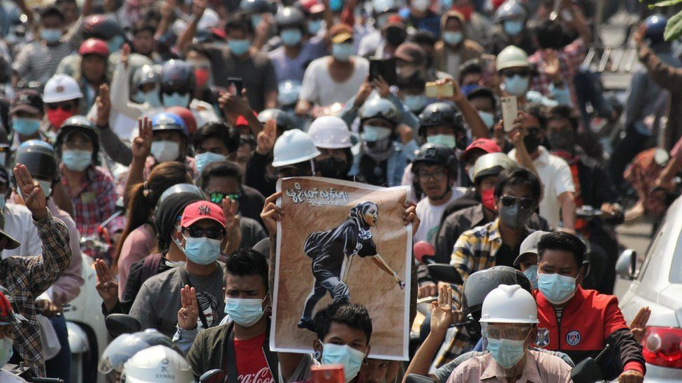 People attend the funeral of Angel a 19-year-old protester