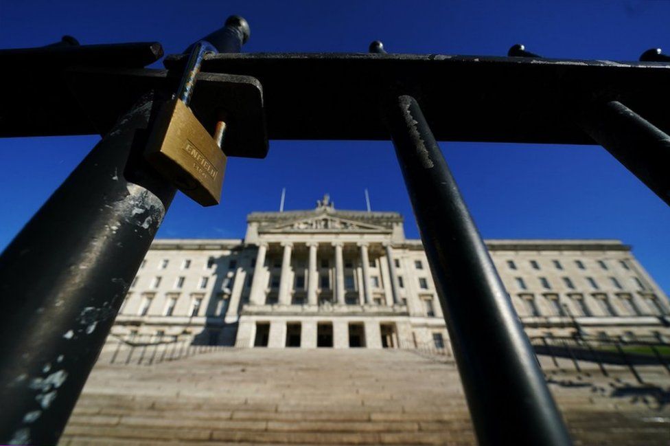 A lock on a gate outside Parliament Buildings at Stormont