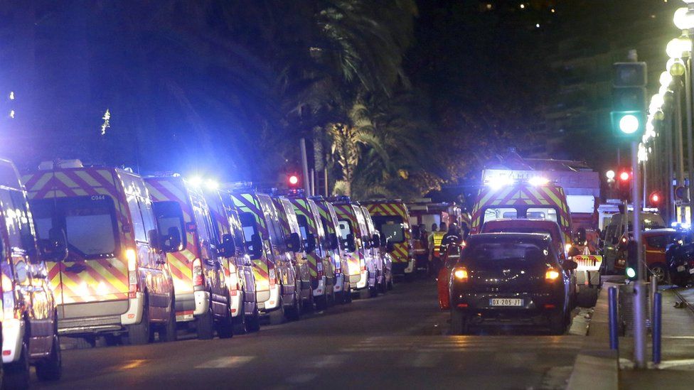 Ambulances line up near the scene after a truck ploughed through a crowd in Nice on Bastille Day