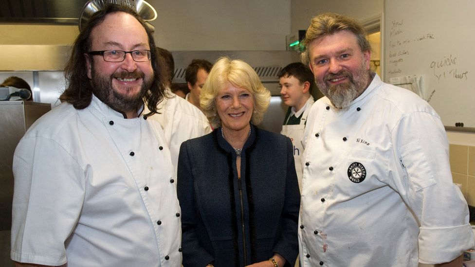 Camilla, Duchess of Cornwall (C) and Hairy Bikers Dave Myers (L) and Si King (R) attend the British Food Fortnight Secondary School Competition at Clarence House, on January 27, 2011 in London