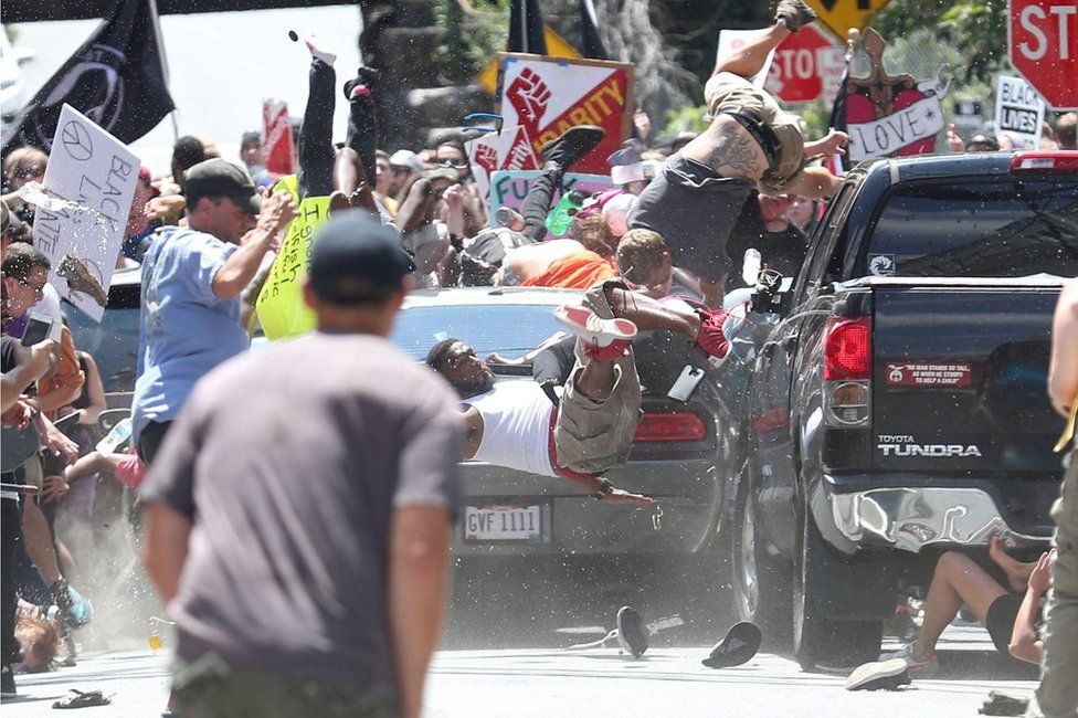 Ryan Kelly took 80 pictures as the car sped past, on his last day as a photographer. He won the Pulitzer Prize for this frame