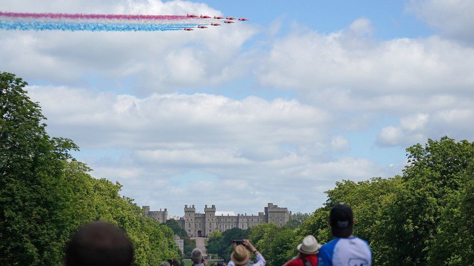 The Red Arrows fly over Windsor Castle to mark the official birthday of Queen Elizabeth II. Picture date: Saturday June 12, 2021.