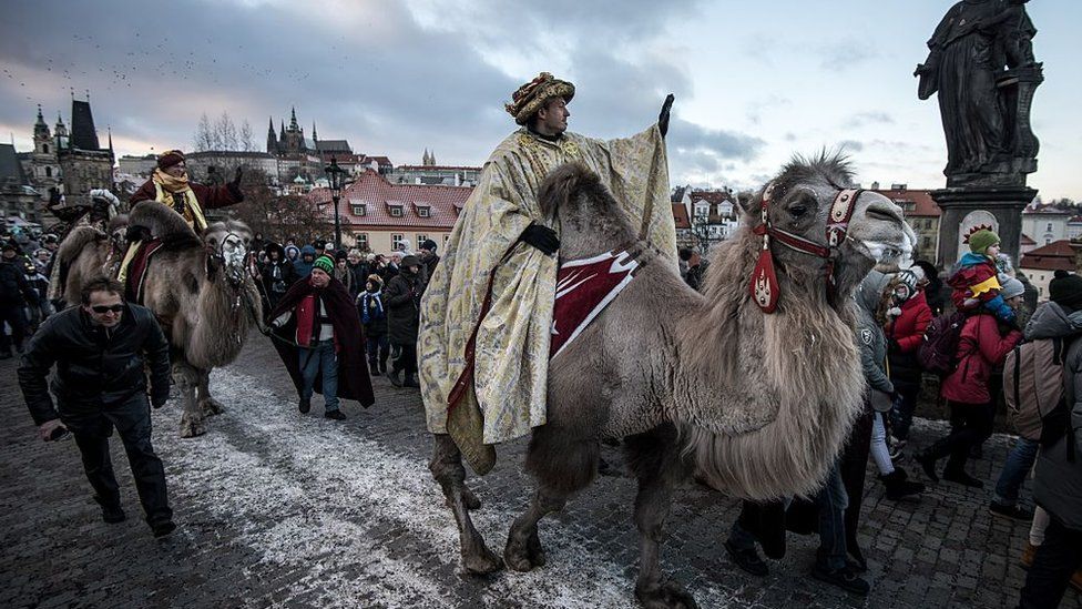 men-riding-on-camels.