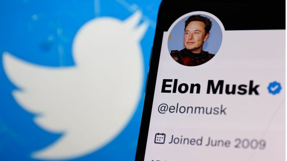 Twitter logo with Musk