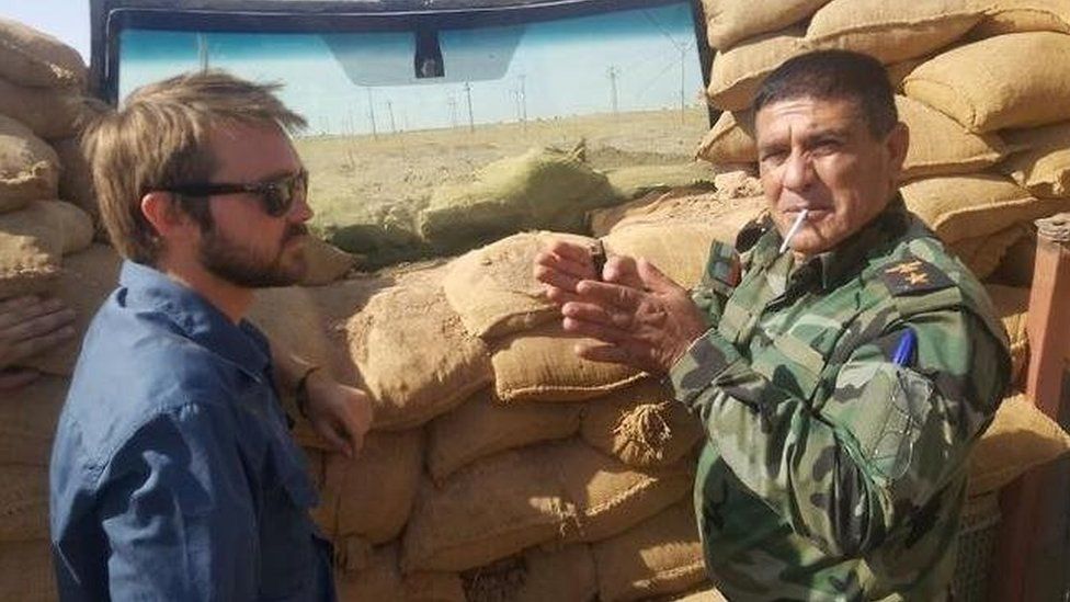 Wyatt Roy with a member of the Peshmerga in Sinjar area, west of Mosul, Iraq