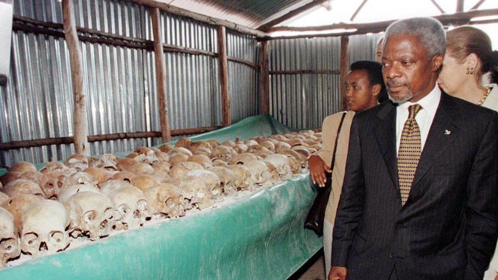 UN Secretary General Kofi Annan walks by skulls at the Mwulire Genocide memorial 8 May 1998. Annan pressed ahead with his troubled visit to Rwanda, braving hecklers at the memorial site here for the 1994 genocide following his icy reception in Kigali.