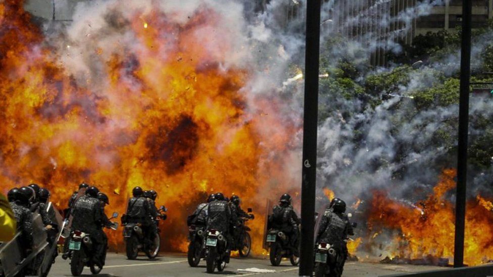 Police on motorbikes are targeted by an explosion