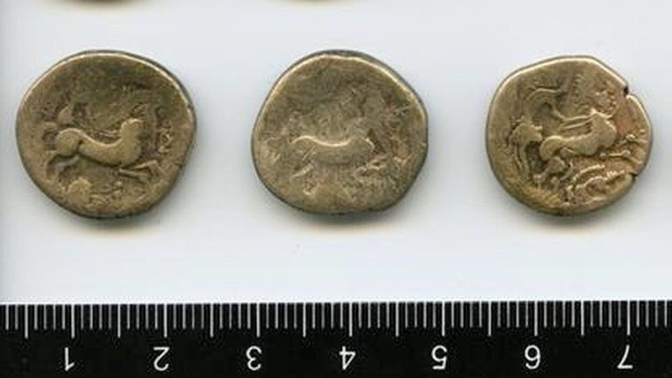 Three of the 40 Iron Age gold coins