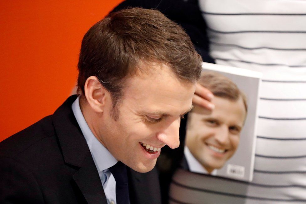 Emmanuel Macron attends an autograph session for his book Revolution in Paris, France, 24 November