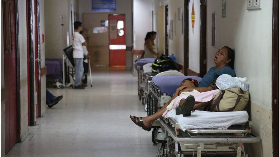 People waiting in a corridor in San Rafael hospital, El Salvador (July 2015)
