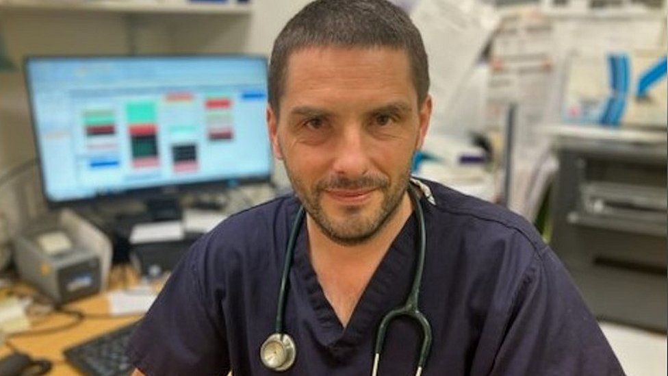 Dr Paul Evans at his desk