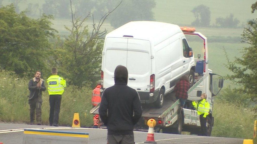 Vehicles being towed away on the A4 near Avebury
