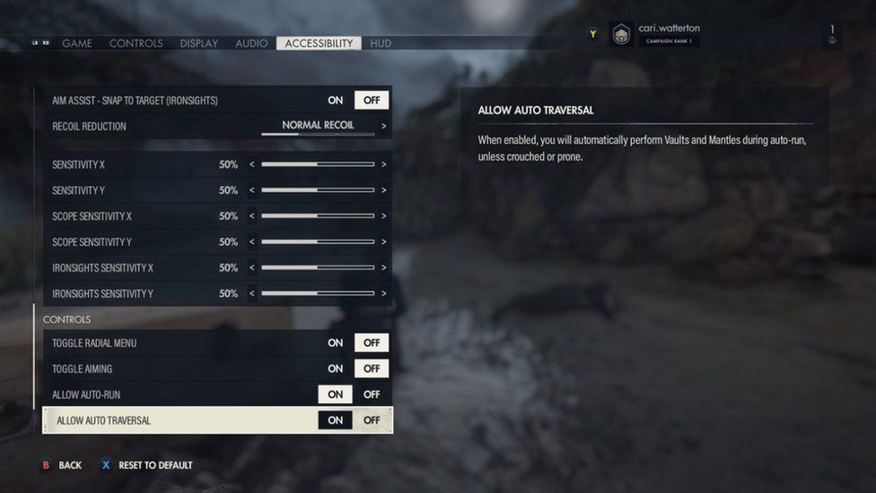 An accessibility menu from Sniper Elite 5. Options are listed in a column on the left-hand side of the screen. In the "Controls" sub-menu "Allow auto-traversal" is highlighted and set to "on". To the right of the screen, a tool tip headed "Allow Auto Traversal" is visible. Underneath the heading, the explanation reads: "When enabled, you will automatically perform vaults and mantles during auto-run, unless crouched or prone." Other options visible on the left include "Allow auto-run", "Toggle aiming", "Toggle Radial Menu", as well as various sensitivity adjustments and aim assist features.